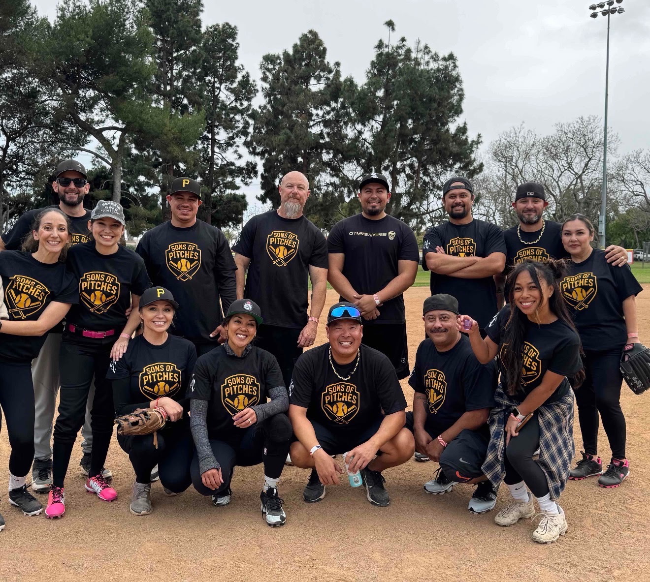 Long Beach softball team group photo in matching custom screen-printed Sons of Pitches t-shirts by CC Print