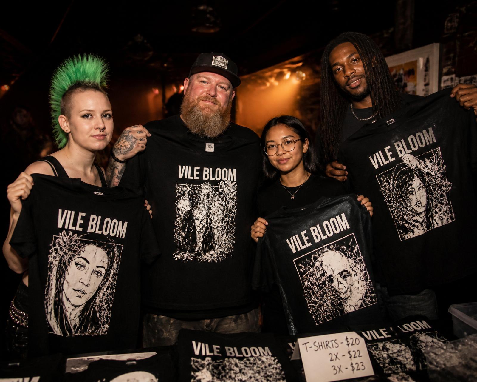 Fans wearing custom band t-shirts printed by CC Print at a live show